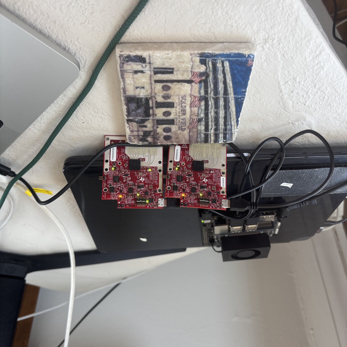 Bench rig: two TI IWR6843 mmWave radar boards wired to a Jetson